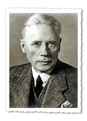 Ein altes Foto von Heinrich Grone. Ein Mann mit kurzen blonden Haaren und braunen Augen.